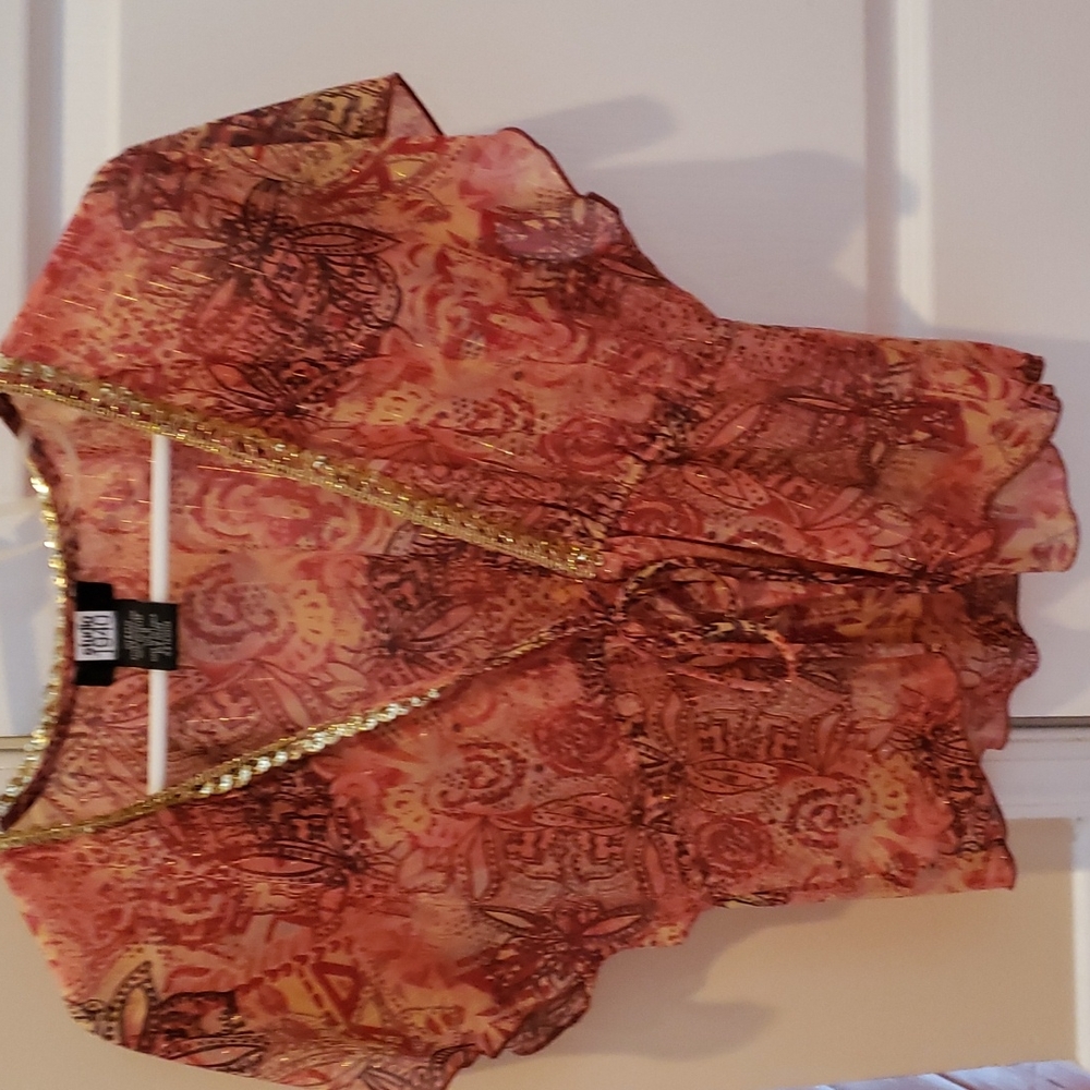 Orange top with gold trim
